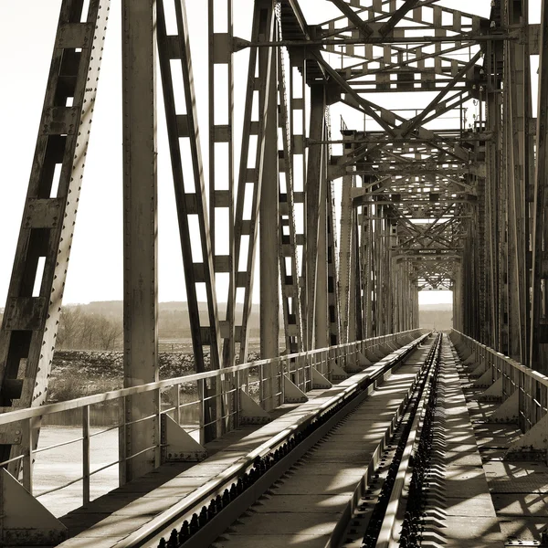 Old vintage railway bridge over river — Stock Photo, Image