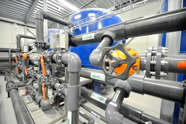 New plastic pipes and colorful equipment in industrial boiler room — Stock Photo, Image