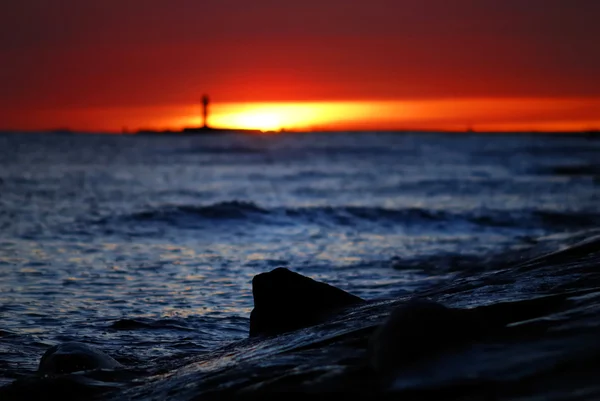 Zachód słońca na brzegu morza — Zdjęcie stockowe