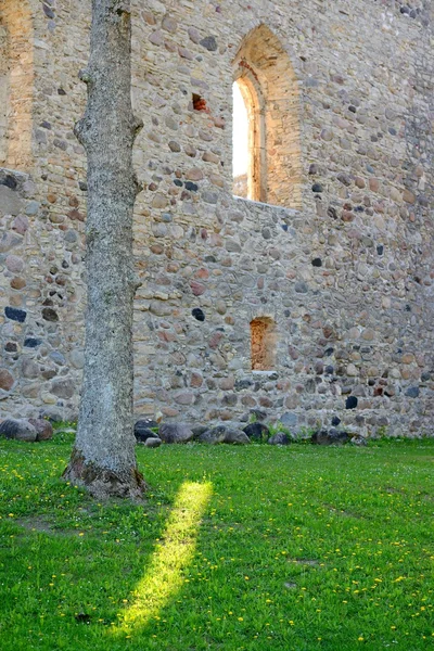 Window and morning sunstar in an old castle wall — Stock Photo, Image