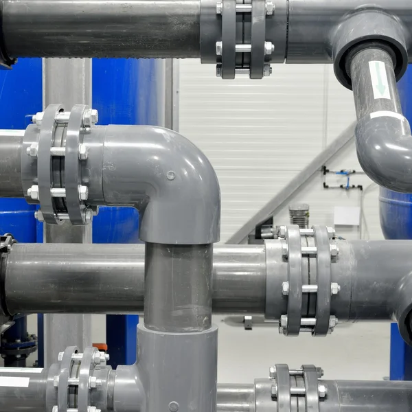 Plastic pipes in industrial boiler room — Stock Photo, Image