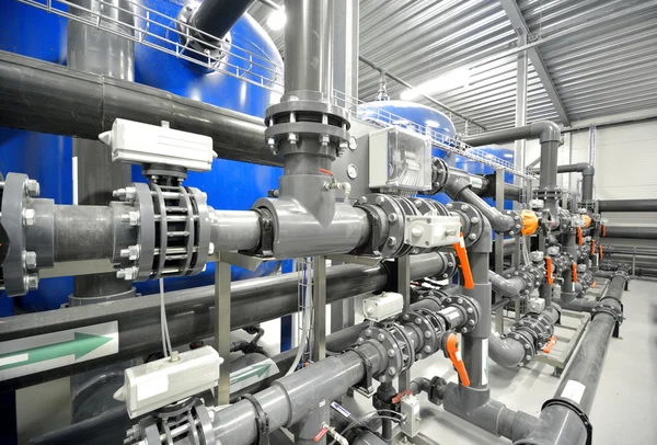 New plastic pipes and colorful equipment in industrial boiler room — Stock Photo, Image