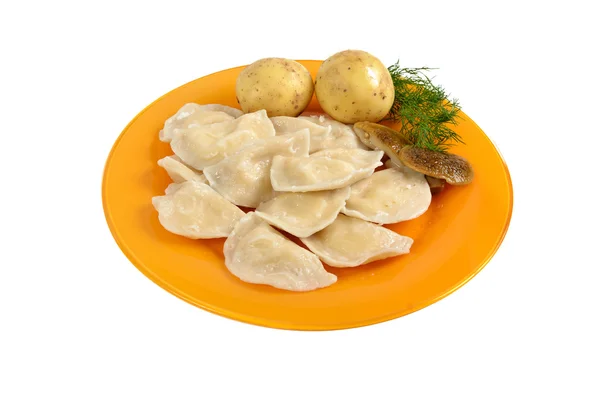Potato and mushrooms dumplings on the dish — Stock Photo, Image