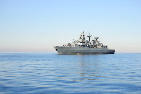 Grey modern warship sailing in still water — Stock Photo, Image