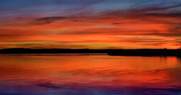 Colorful sunrise at the field with morning fog — Stock Photo, Image