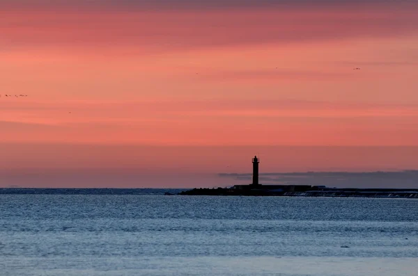 Lighthouse in sunset — Stockfoto