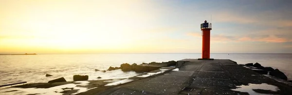 Empty Promenade Orange Lighthouse Solar Battery Colorful Sunset Sky Stunning — Stock Photo, Image