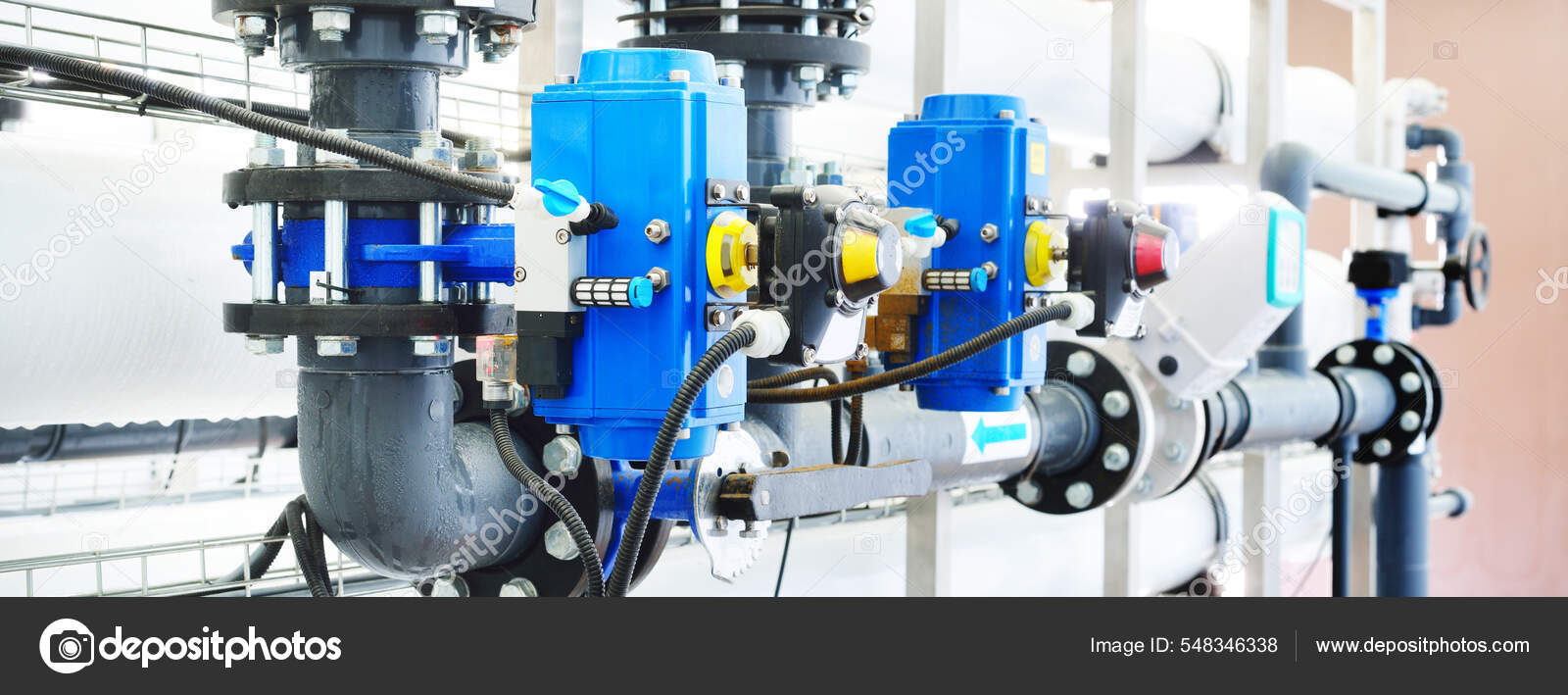 Large Industrial Water Treatment Boiler Room Shiny Steel Metal Pipes