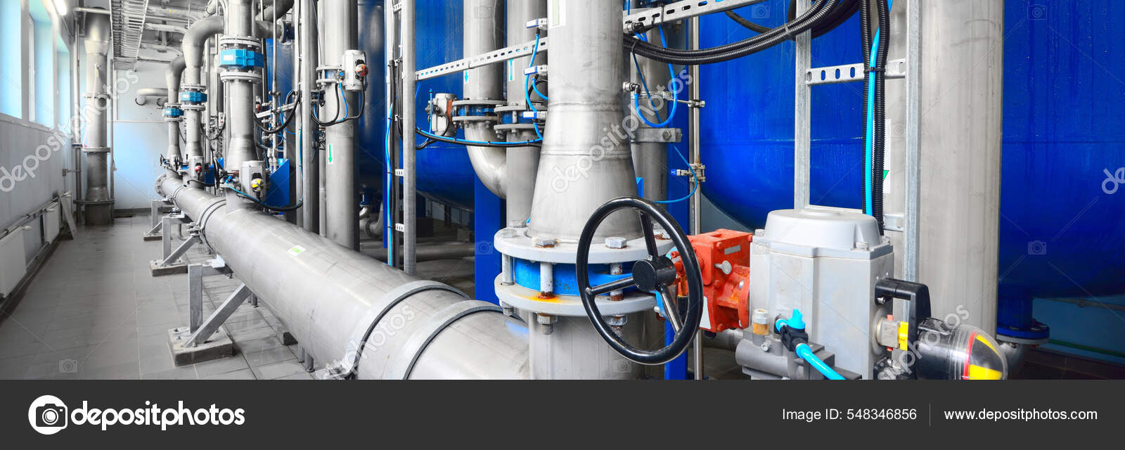 Large Industrial Water Treatment Boiler Room Shiny Steel Metal Pipes