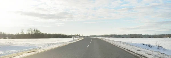 Empty Highway Asphalt Road Snow Covered Forest Fields Rural Area — ストック写真