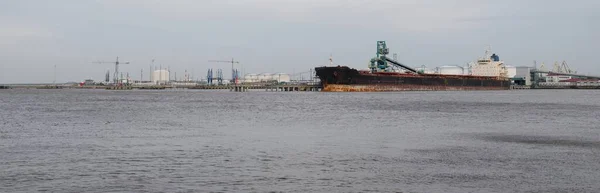 Large Ship Anchored Cargo Port Terminal Cranes Background Ventspils Latvia —  Fotos de Stock