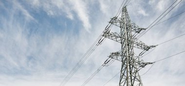 Electricity power line. Dramatic sky. Concept urban landscape. Energy, power generation, equipment, industry, environmental damage, pollution, ecology, supply, infrastructure