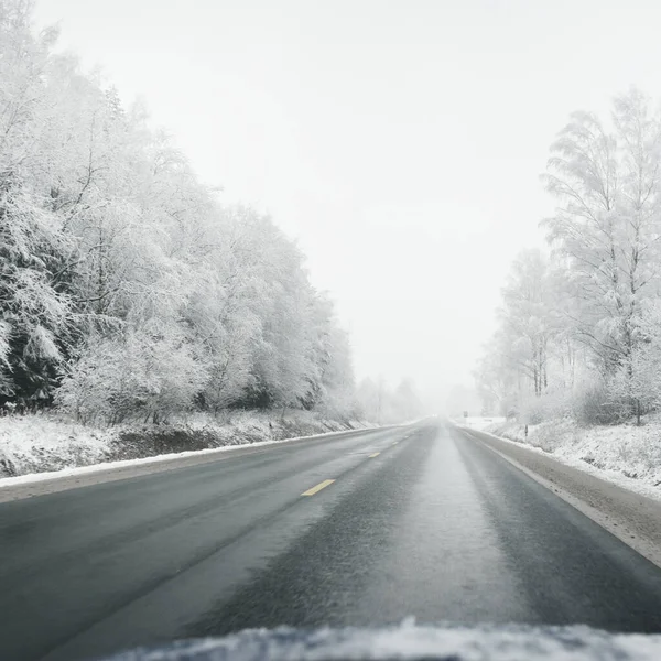 Empty Highway Asphalt Road Snow Covered Forest Rural Area View — 스톡 사진