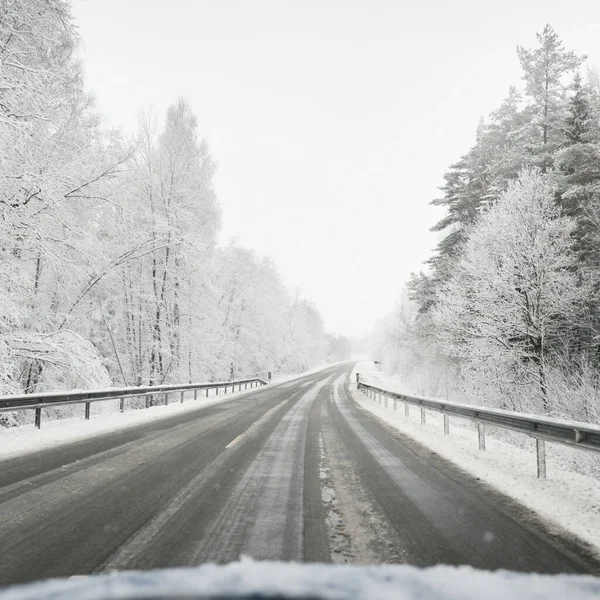 Empty Highway Asphalt Road Snow Covered Forest Rural Area View — 스톡 사진