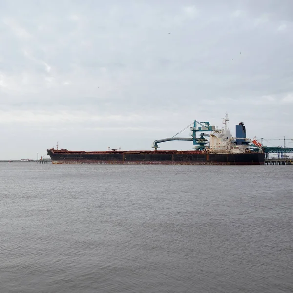 Large Ship Anchored Cargo Port Terminal Cranes Background Ventspils Latvia — Stock Photo, Image