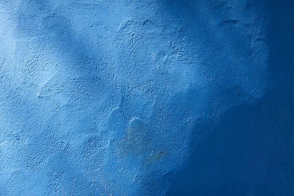 Concrete wall texture. Blue tones, shadows. Soft sunlight. Natural pattern, texture, background, wallpaper, graphic resources, copy space