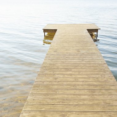 Forest river (lake) on a sunny day. Wooden pier. Water surface and wood texture. Idyllic landscape, rural scene. Nature, ecology, ecotourism, hiking, ecological resort, local tourism