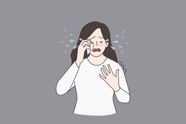 Mutsuz bir kız depresyonda ağlar. 