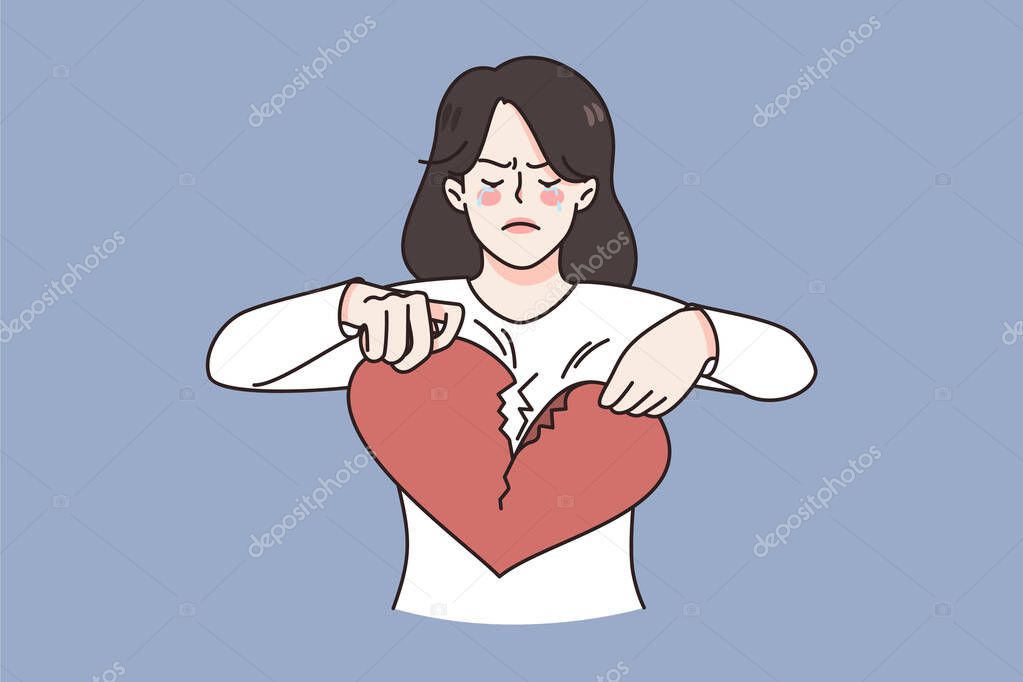 Breaking up and Broken heart concept. Young sad unhappy disappointed crying woman standing and breaking huge red heart into pieces vector illustration
