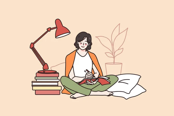 행복 한 소녀는 집에 앉아서 책을 쓰며 공부 한다 — 스톡 벡터