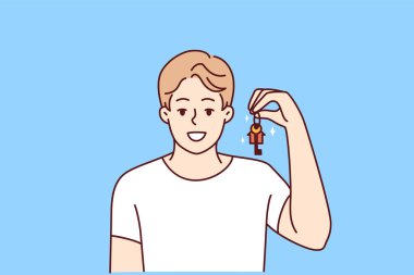 Elinde yeni evin ya da dairenin anahtarı olan gülümseyen genç adam. Kendi evi olan mutlu bir adam. Kira ve emlak kavramı. Vektör illüstrasyonu. 