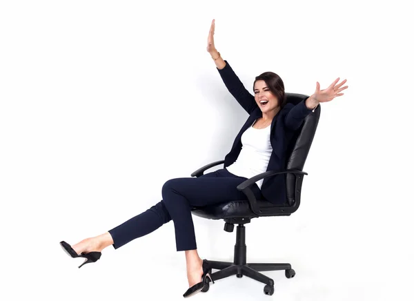 Happy successful business woman in office chair — Stock Photo, Image