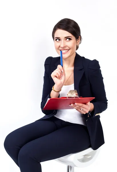 Happy successful business woman with red folder on white background — Stock Photo, Image