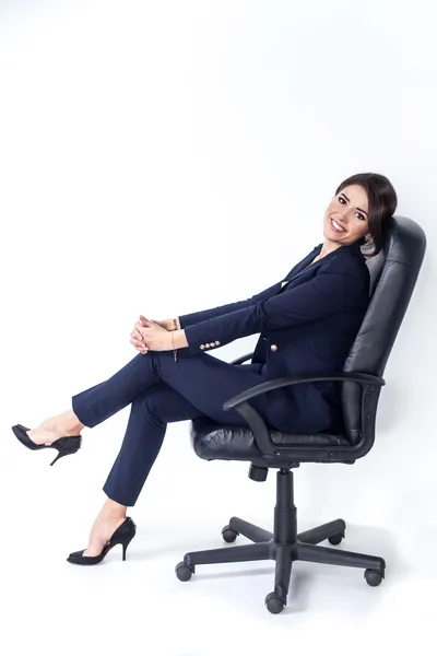 Happy successful business woman in office chair on white background — Stock Photo, Image