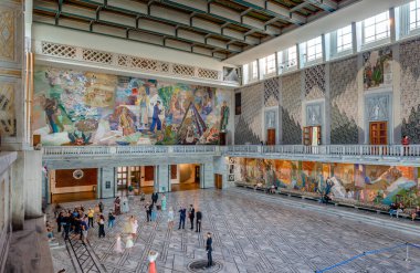 Oslo, Norway - August 13 2022: View of the  main hall of the Oslo City Hall, with the Henrik Sorensen's decoration.