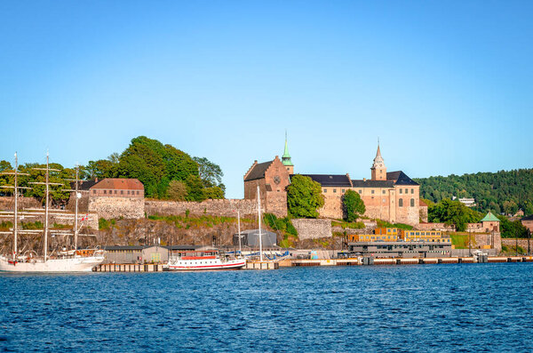 Oslo, Norway - August 13 2022: Akersus Fortress seen from the sea (Oslofjord).