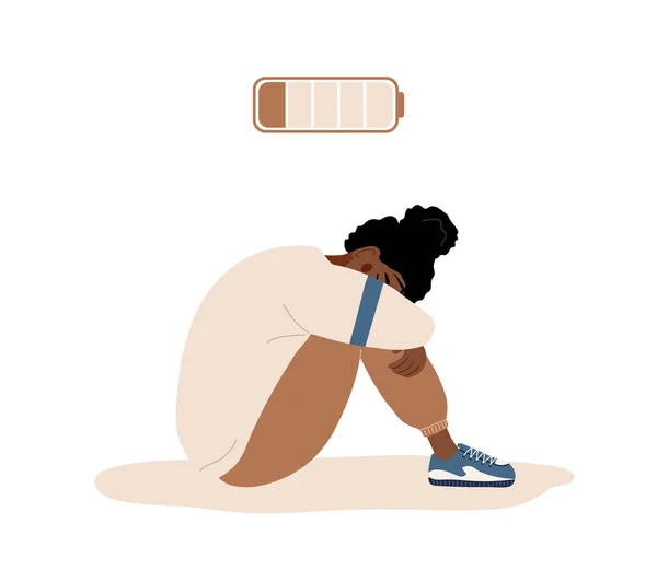 Эмоциональное выгорание. Грустный африканский подросток с низкой батареей, сидящий на полу и плачущий. Проблемы психического здоровья. Концепция усталости, стресса и усталости. Векторная иллюстрация в плоском стиле мультфильма — стоковый вектор