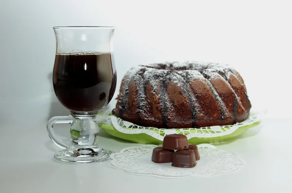 Chocolate cake, truffle and a cup of coffee — Stock Photo, Image