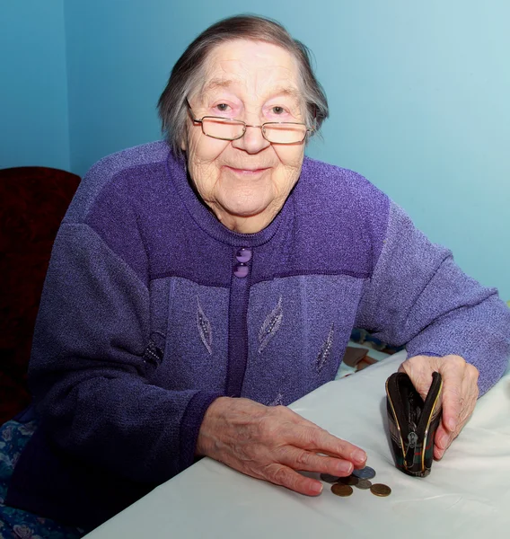 Elderly grandmother believes penny in your wallet — Stock Photo, Image