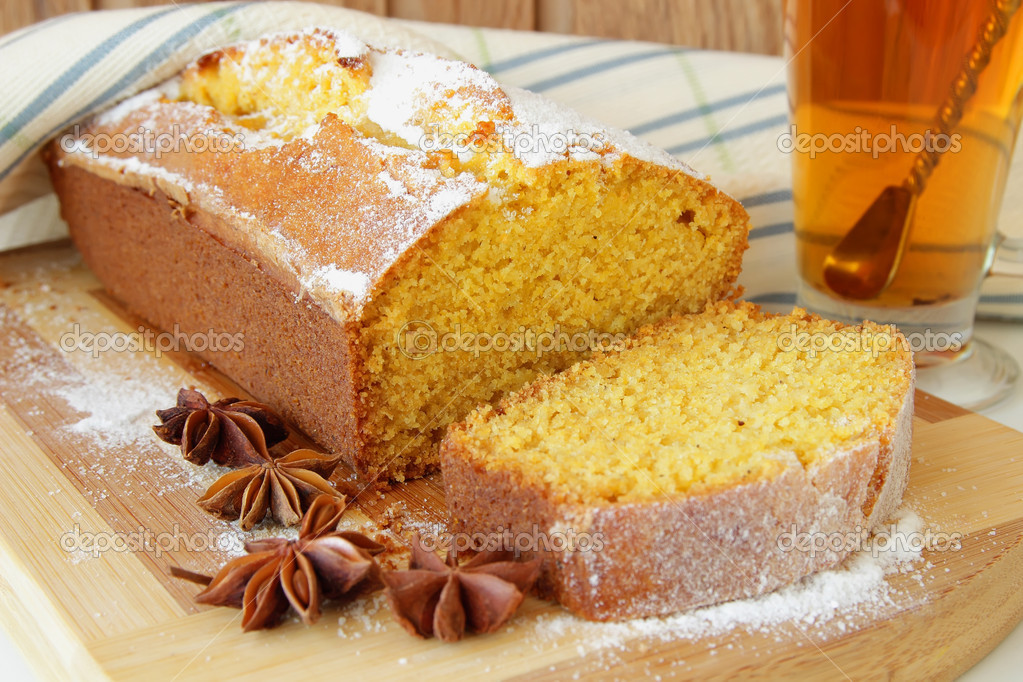 Sponge cake made from corn flour and a cup of tea — Stock Photo