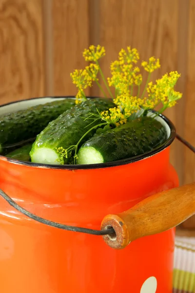 Cucumbers in brine drenched cans with spices — Stock Photo, Image