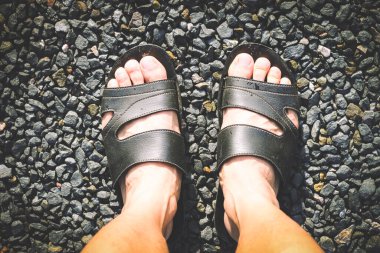 River Stone 'un ayakkabı ayağı, Stone in the Park, Stone zemin yapısı, Sea Stones arka planı.
