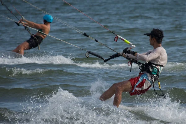 Close-up of male and female kite surfers — Stock Photo, Image