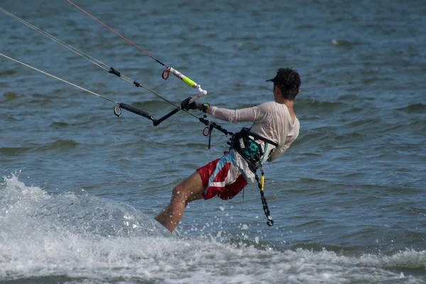 Close-up of male kite surfer in cap — Stock Photo, Image