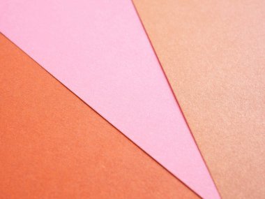 Empty gradient pink-orange colored paper background texture. Abstract geometric flat composition. The concept for image, text, and design