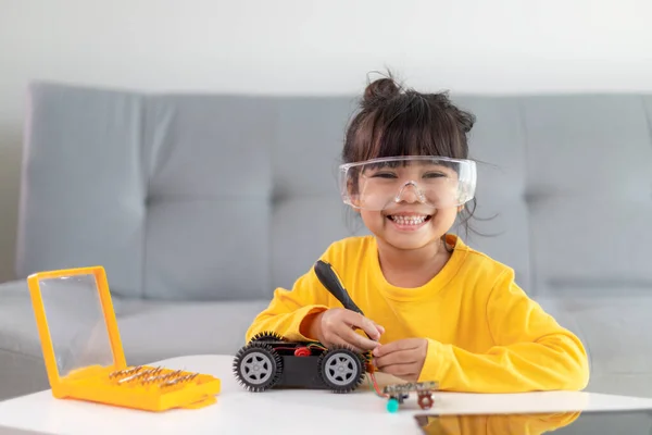 Inventive Kid Constructing Robot Cars Home — Stock Photo, Image