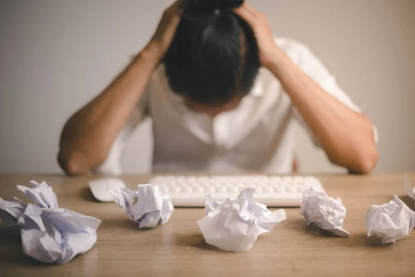 Businessman Sitting Head Hands Desk Covered Crumpled Papers Office Worker — Zdjęcie stockowe