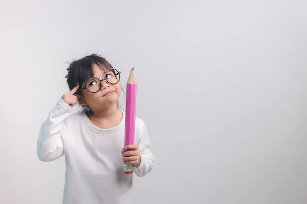 Excited Young Girl Kid Holding Big Pencils Her Hands Back — стоковое фото