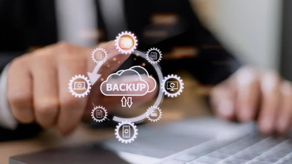 Backup files and data on internet with cloud storage technology that sync all online devices and computers with network connection, protection against loss, business person touch screen icon concept