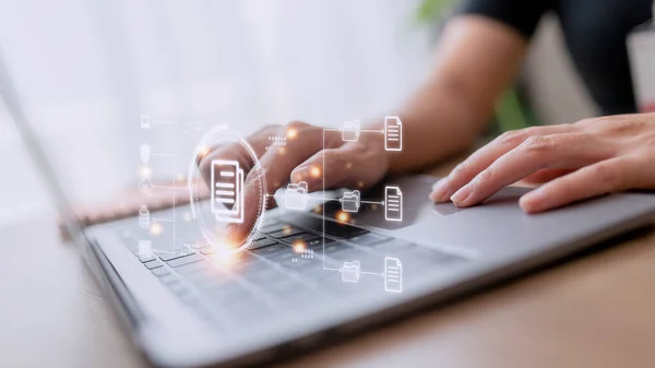 Businesswoman using a computer to document management concept, online documentation database and digital file storage system or software, records keeping, database technology, file access, doc sharing.