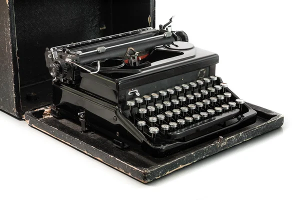 Zwarte schrijfmachine op witte achtergrond — Stockfoto