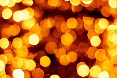Altın bokeh, Noel ışıkları. Yeni yıl süsü. Arkaplan altın afişi.