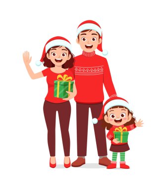 Mutlu anne ve baba ve çocuk Noel 'i kutluyor.