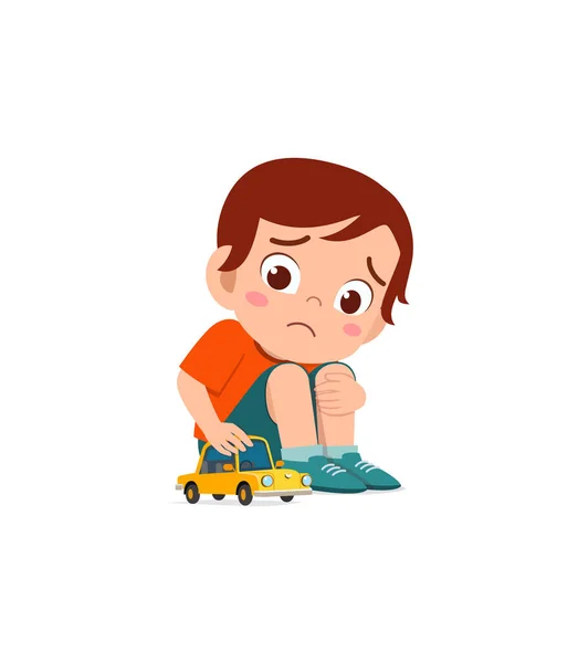 Niedlichen Jungen Spielen Spielzeugauto Allein Und Fühlen Sich Traurig — Stockvektor