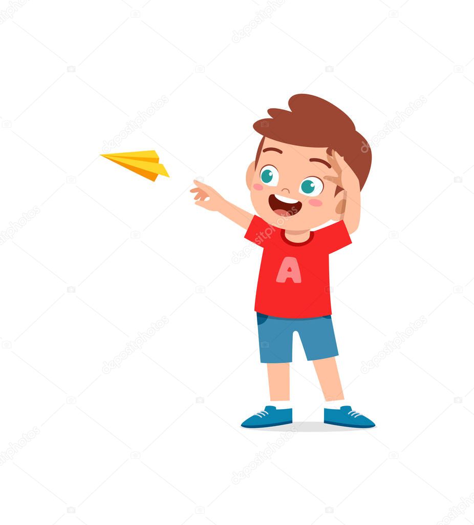 cute little boy play paper plane and feel happy