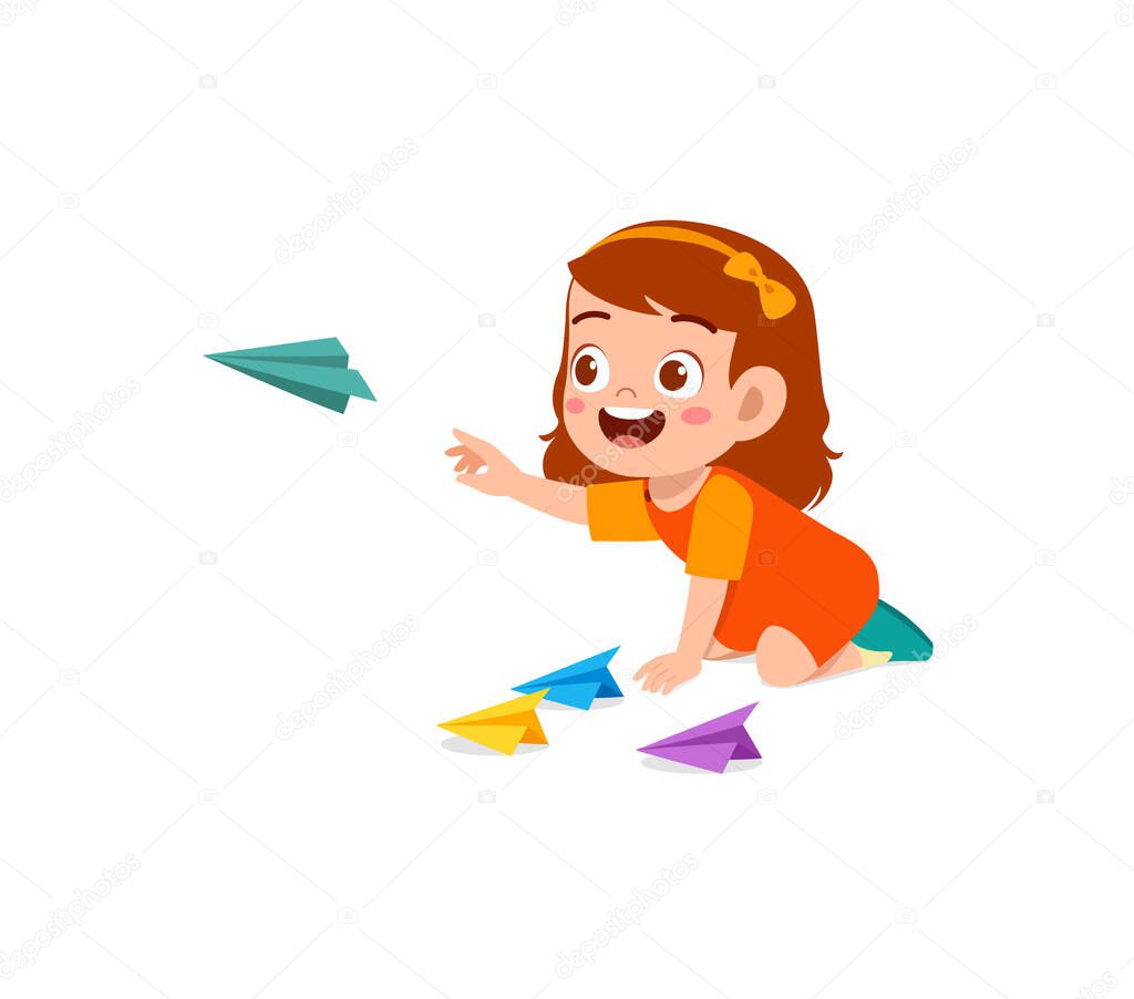 cute little girl play paper plane and feel happy